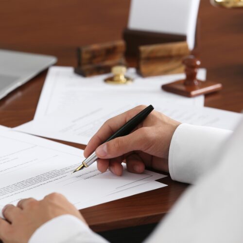 Document being signed at a desk