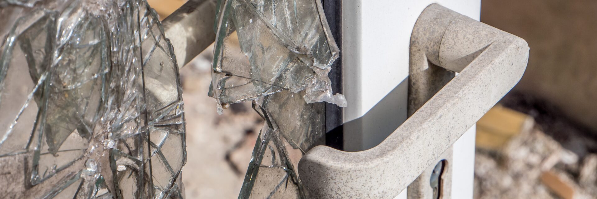 Broken glass on door